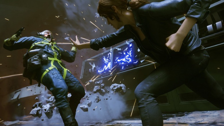 Screenshot from "Control" showing the protagonist pushing an enemy away