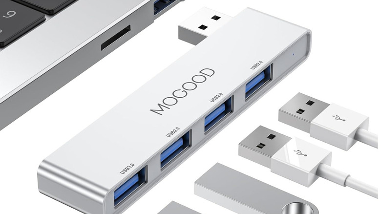 USB hub with plugins and a laptop