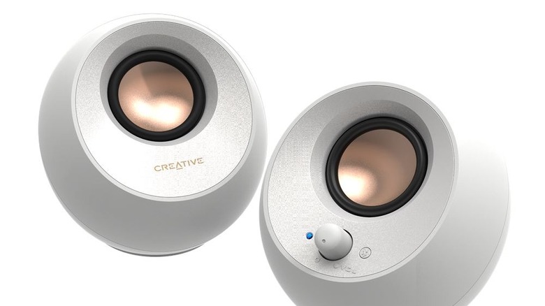 Creative speakers on white background