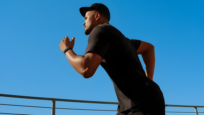A man running with the Google Fitbit air