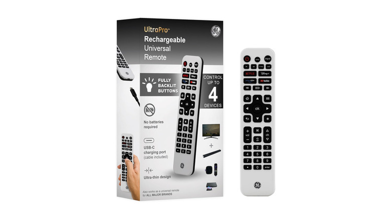 A universal TV remote with its box over a white background
