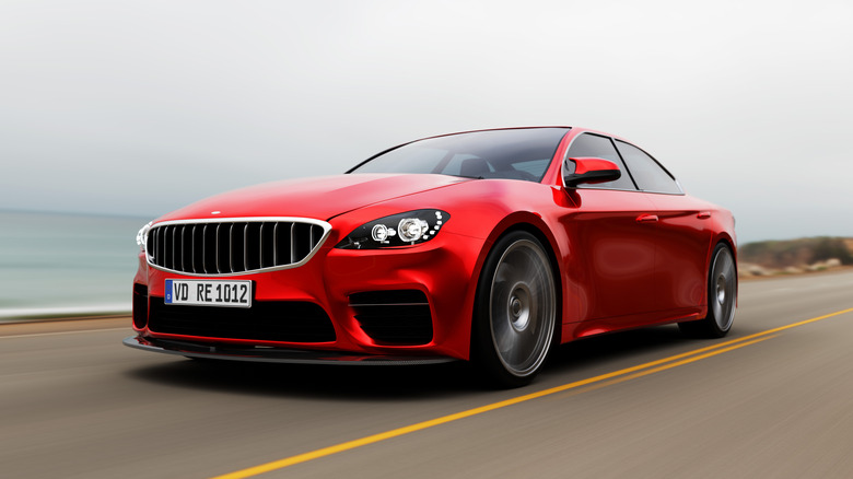 A red model car speeding on the highway