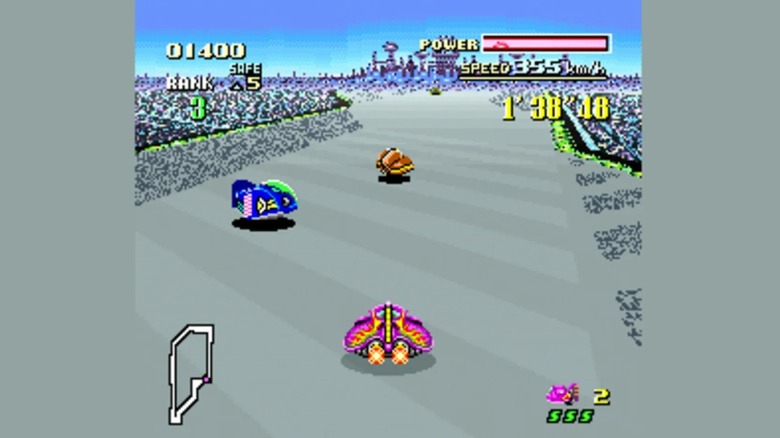three F-ZERO racing machines mid-race