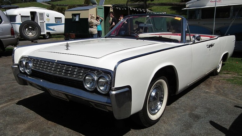 a white 1962 Lincoln Continental convertible