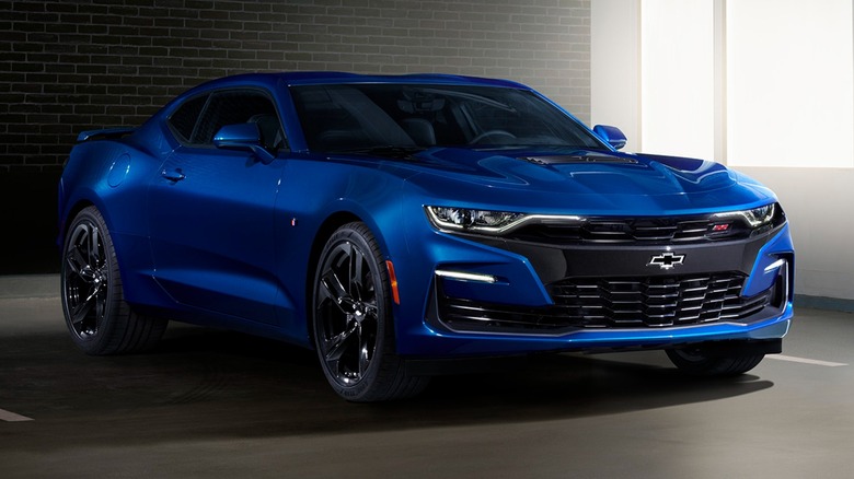a blue 2019 Chevrolet Camaro SS in a parking garage
