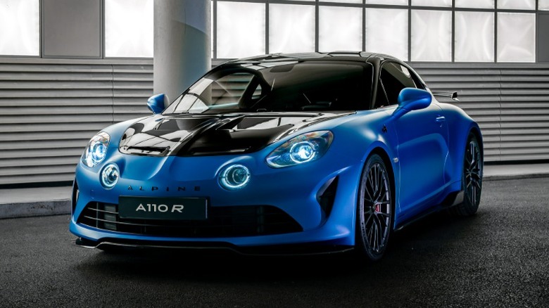 Blue Alpine A110 R parked indoors.