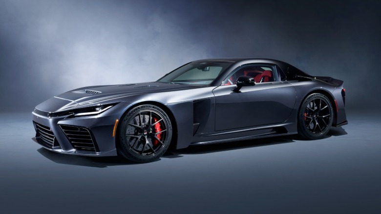 Studio photo of a dark gray GR GT.