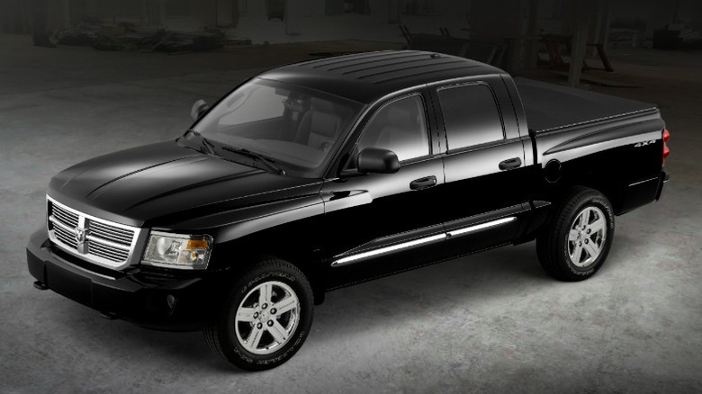 Studio image of black 2011 Dodge Dakota.