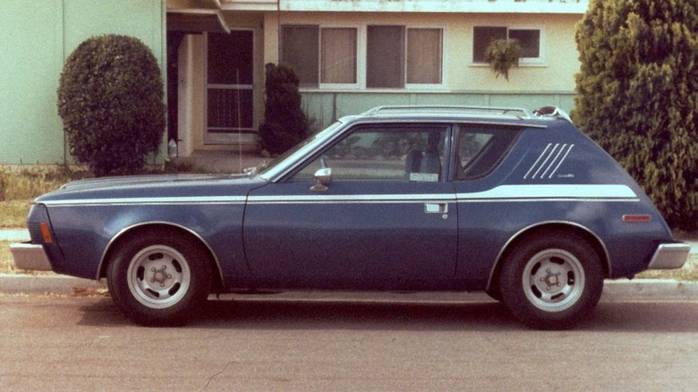 A 1974 AMC Gremlin parked in front of a house in 1978
