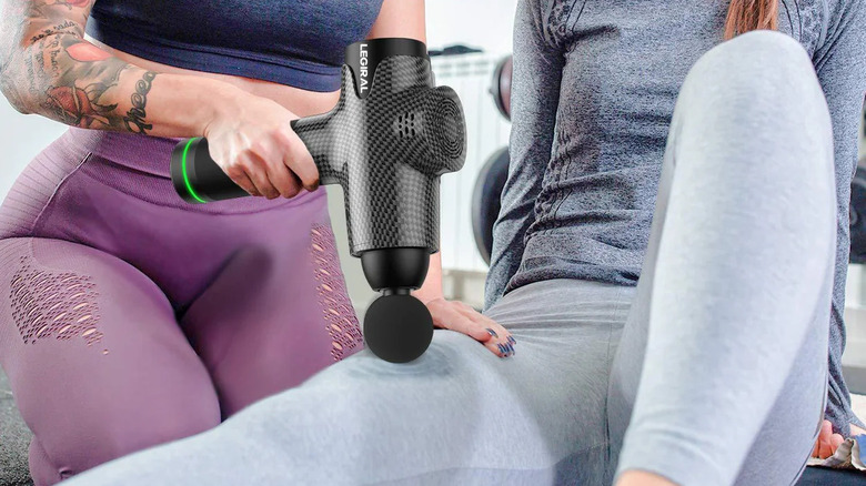 Legiral LE3 massage gun in action