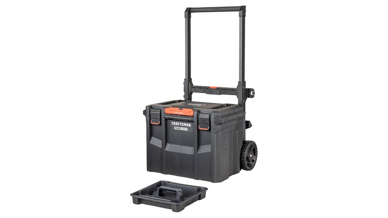 A Craftsman black rolling toolbox next to a tray