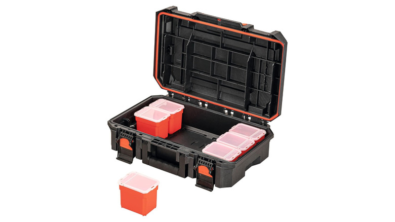 An open toolbox with boxes inside