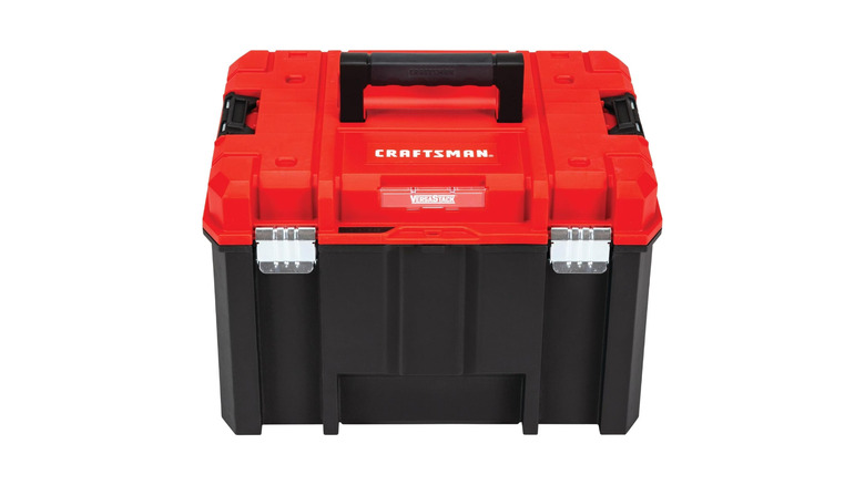A black toolbox with a red lid by Craftsman