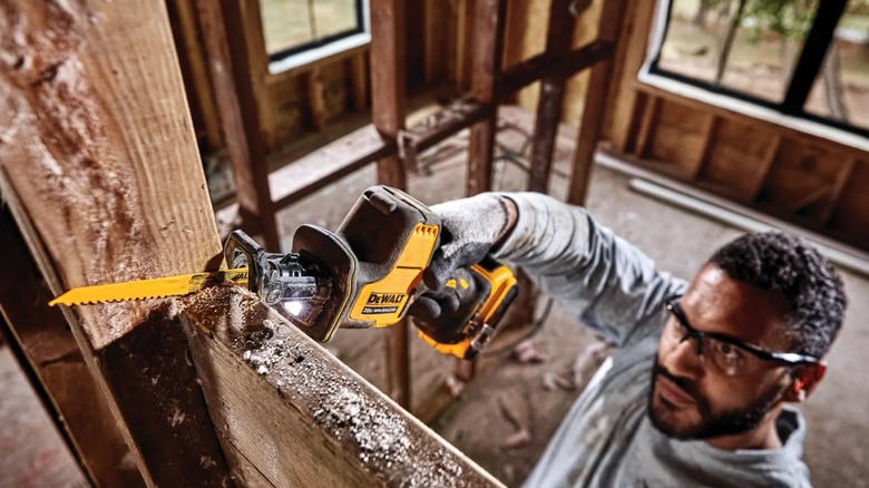 chopping timber with a DeWalt reciprocating saw