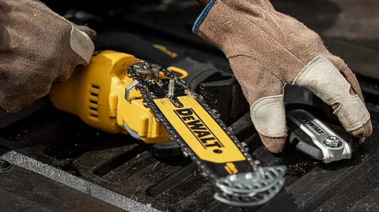performing maintenance on DeWalt pruning chainsaw