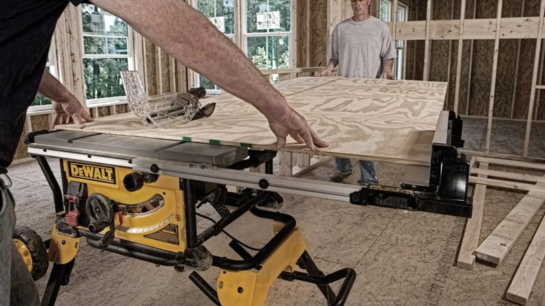 cutting plywood with DeWalt table saw