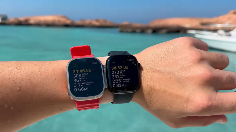 A person swimming with an Apple Watch and Apple Watch Ultra