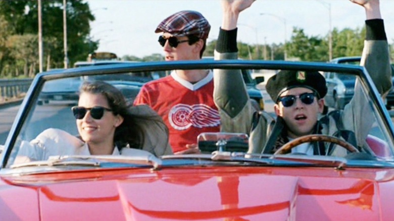 Ferris, Cameron, and Sloane driving down the street in Ferrari 250 GT Spyder California Replica in 
