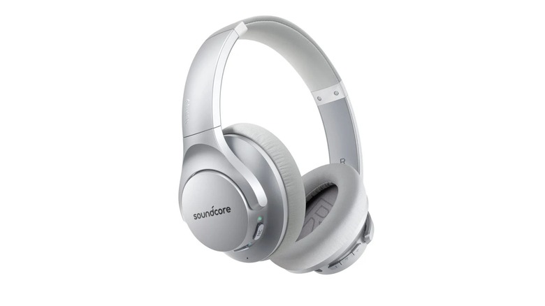 Silver pair of headphones against white background