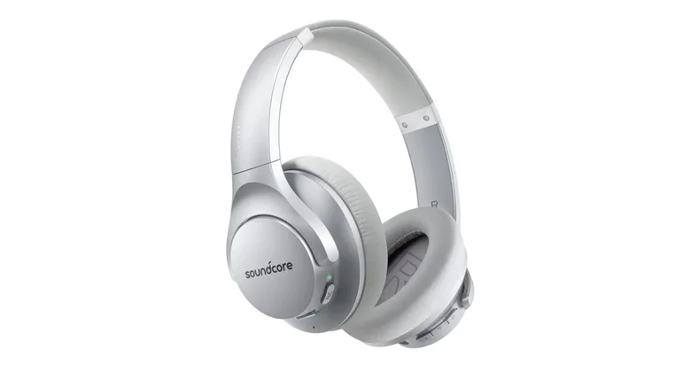 Silver pair of headphones against white background