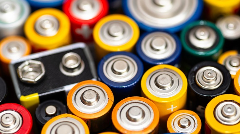 a collection of batteries of various sizes