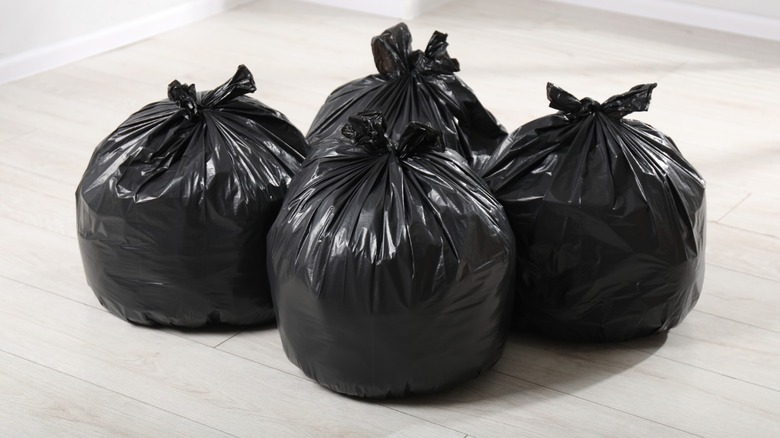 garbage bags on the floor