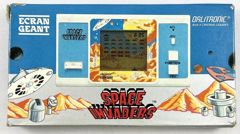 The box for the Tiger Electronics Space Invaders handheld LCD game