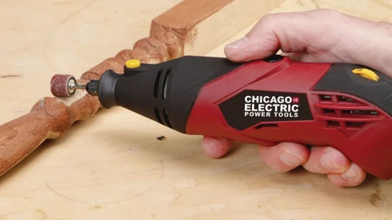Person using Chicago Electric Variable-Speed Rotary Tool