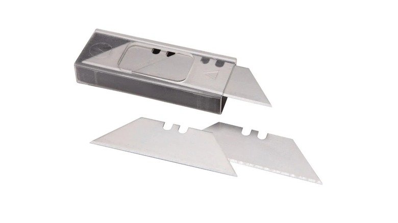 Stock image of a set of razor blades in a case