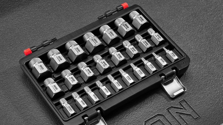 A Multispline Screw Extractor Set on a black surface with a leather texture