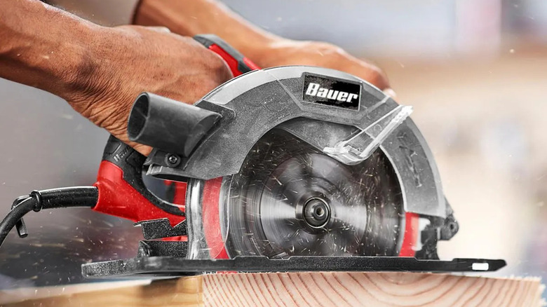 A Bauer circular saw cutting through material