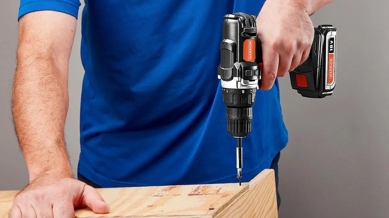 Man using a Warrior 3/8 inch drill