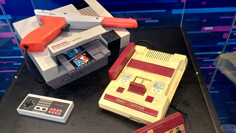 A Nintendo Entertainment System and Famicom on display
