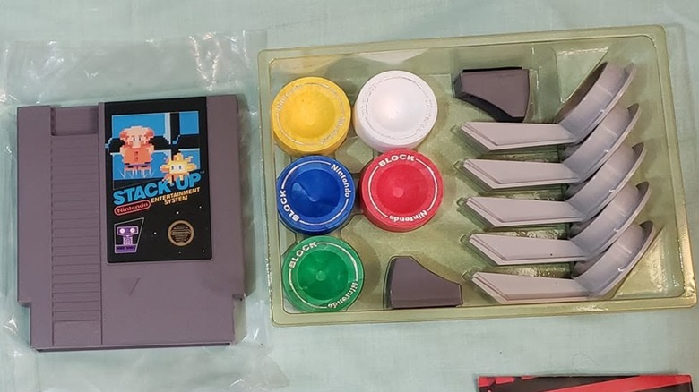 The Nintendo Entertainment System game Stack Up and its accessories