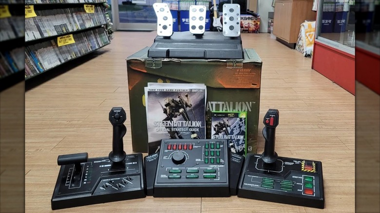 The Steel Battalion Mega-Jockey-9000 displayed on the floor with the game and all components