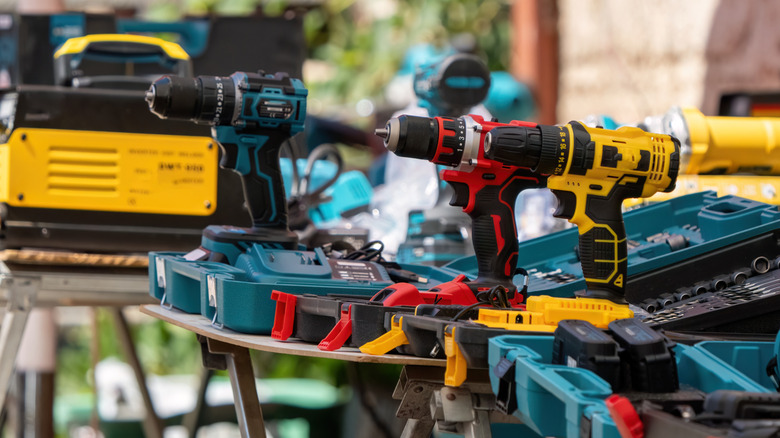 Various brightly colored power tools