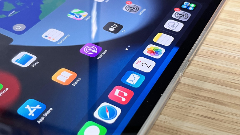 Photo of iPad showing app icons
