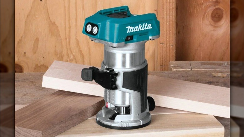 Makita XTR01Z compact router on a worksite