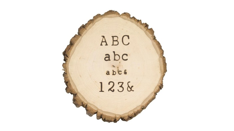 Wood marked by hot stamps