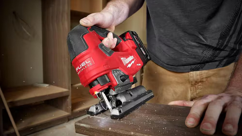 Milwaukee M18 Fuel jig saw being used to construct furniture