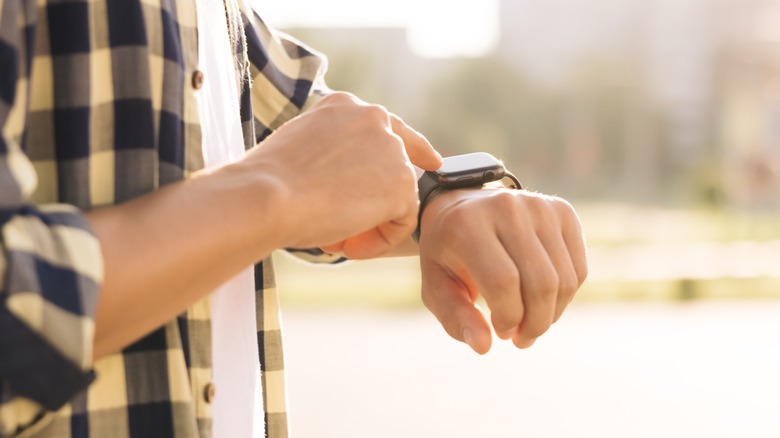 Person looking at an Apple Watch screen