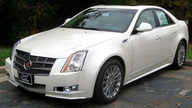 A white Cadillac CTS-V in a parking space