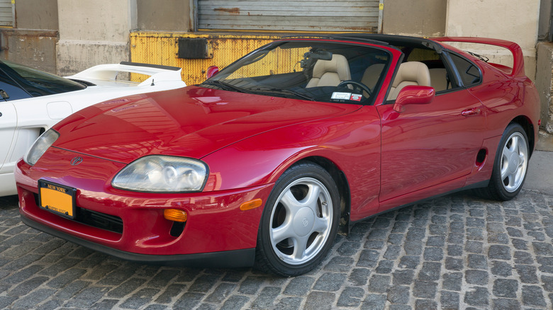 A red Toyota Supra 4th generation in red