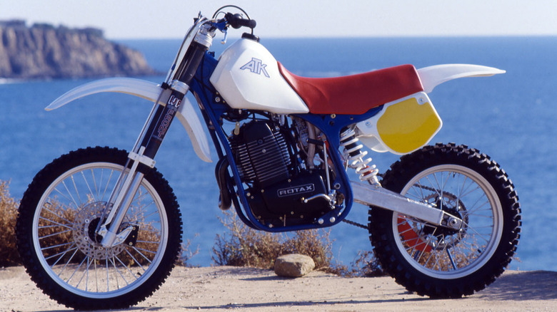 ATK motorcycle parked in front of the ocean