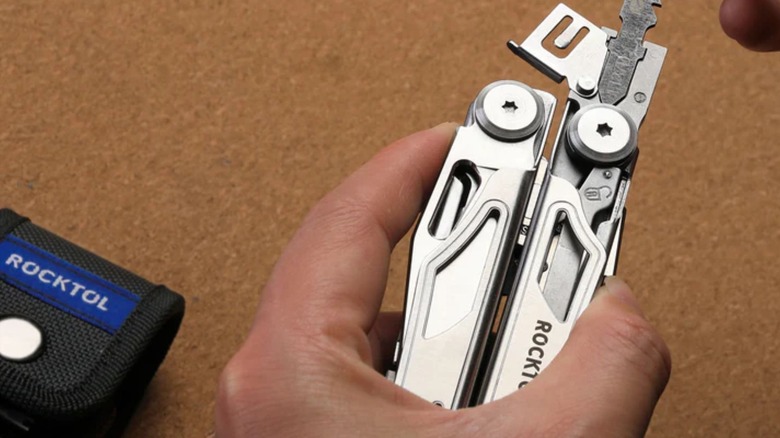 Man holding RockTol multi-tool