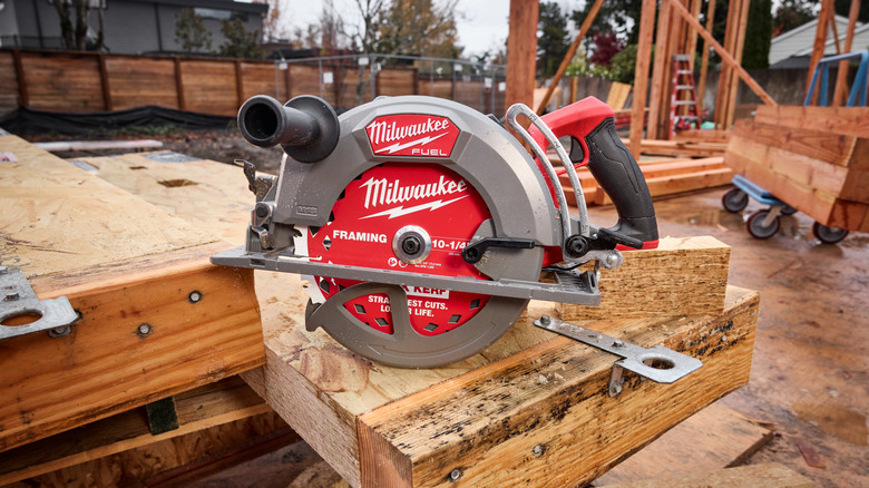 A Milwaukee rear handle circular saw at a jobsite.