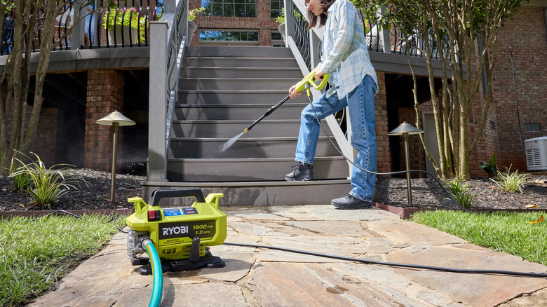 Ryobi 1800 PSI 1.2 GPM pressure washer in action