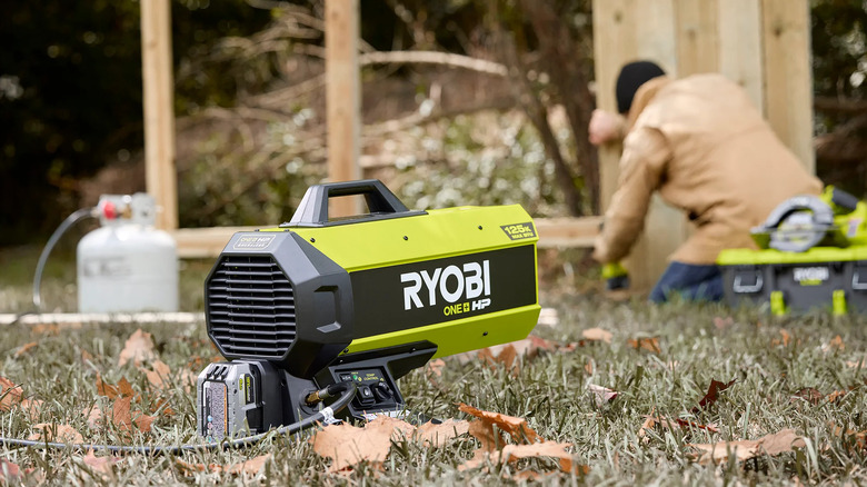Ryobi 18V One+ HP hybrid propane heater on a lawn