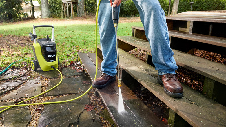 Ryobi 2100 PSI 1.2 GPM pressure washer cleaning decking steps