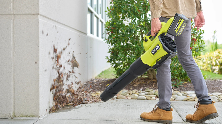Ryobi 40V HP 800 CFM Whisper Series blower blowing leaves